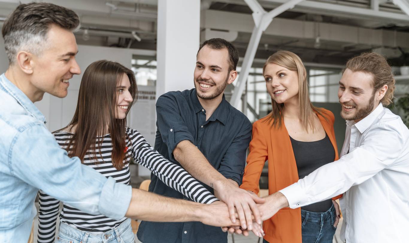 Business people shaking hands in a meeting